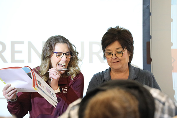 DSU faculty members while teaching students. 